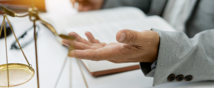 Public defender speaking with a client